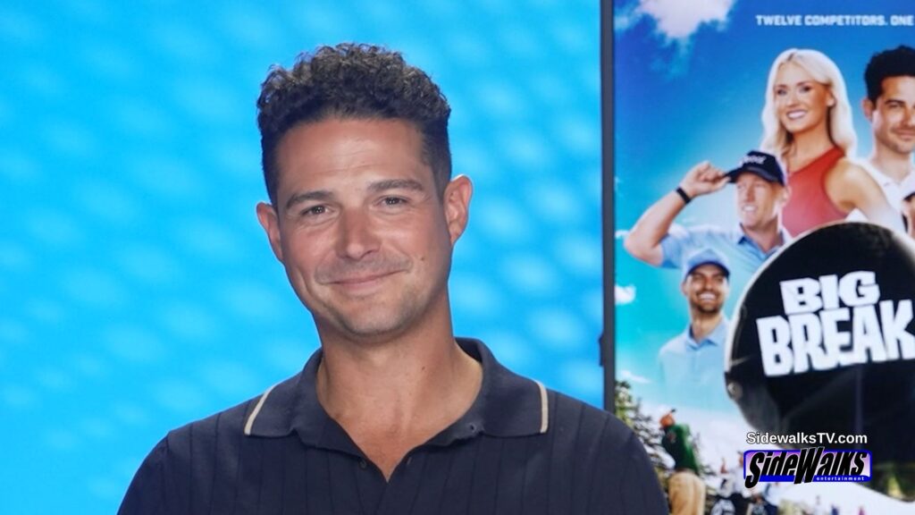Wells Adams grins