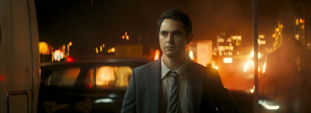 MAX MINGHELLA as John Borrelli looking forward