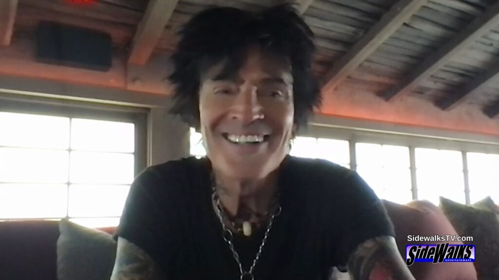 Mötley Crüe's Tommy Lee smiling.