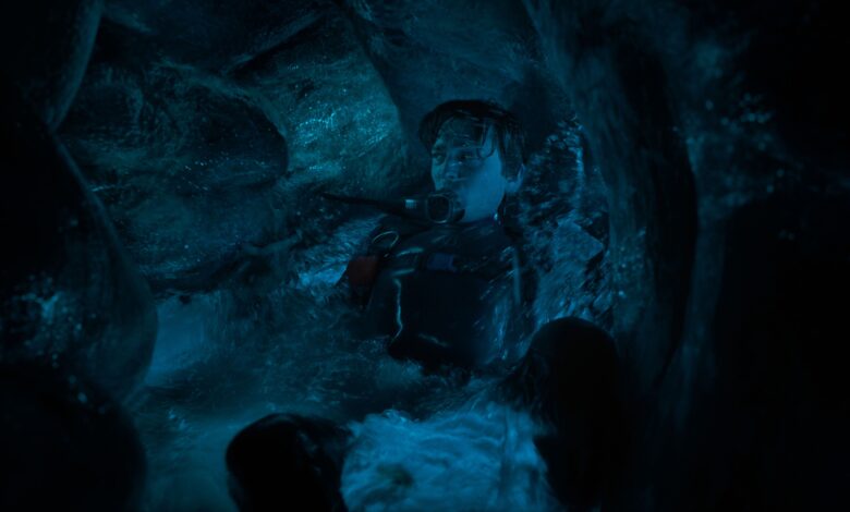 Austin Abrams as Jay Gardiner inside the whale.