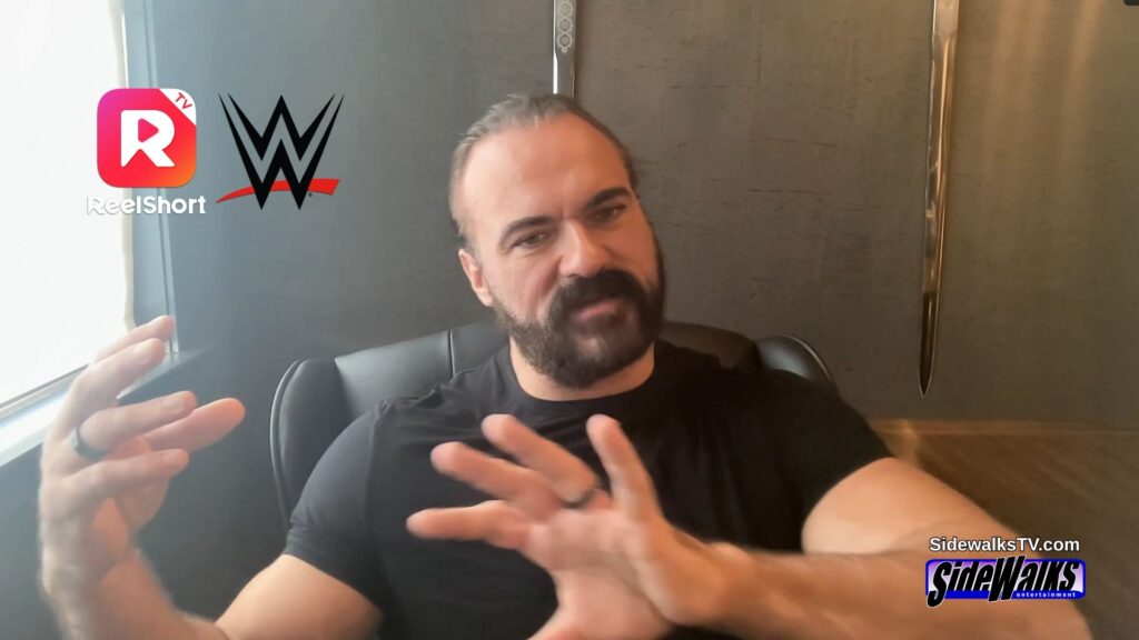 Drew McIntyre moving his hands while talking.